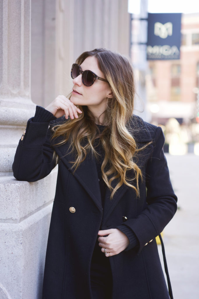 black coat with gold buttons 