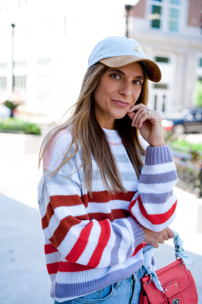 pink, blue, purple, and red striped sweater