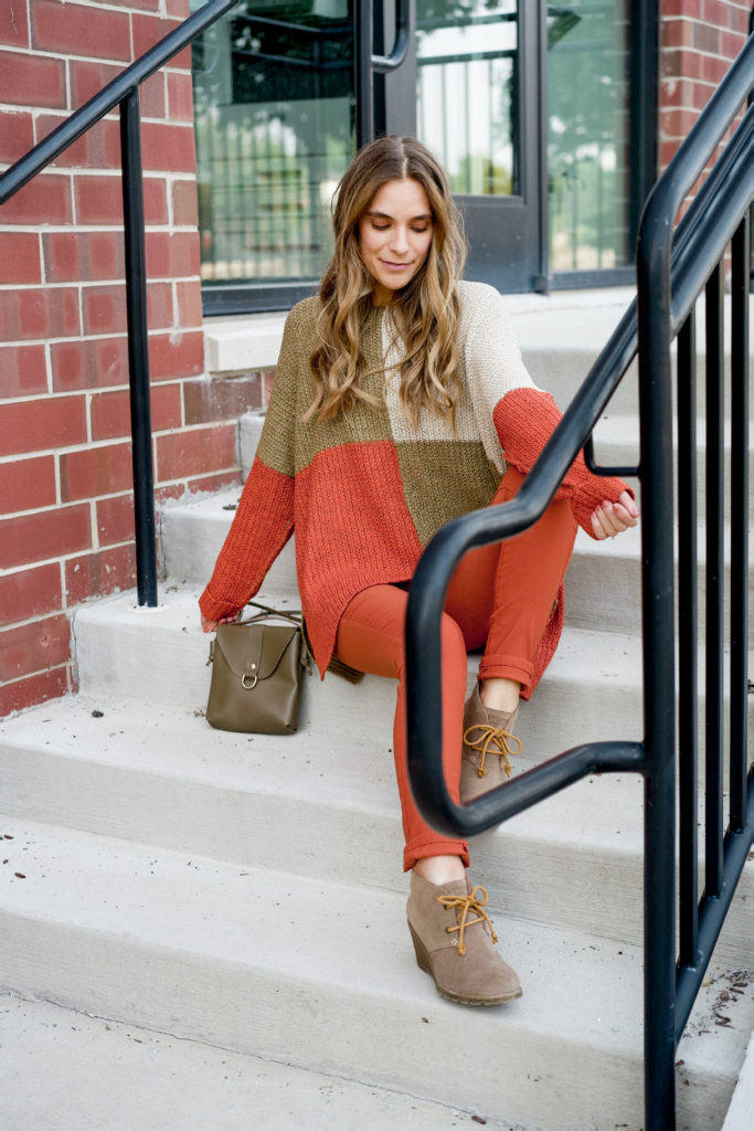 Orange and olive color block sweater